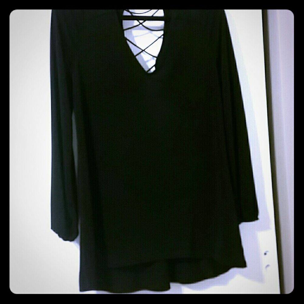 long blouse or it can be worn as a dress